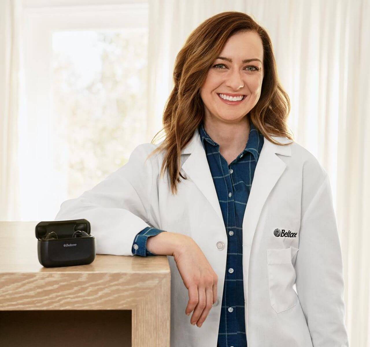 A female hearing aid repair specialist at Beltone Hearing